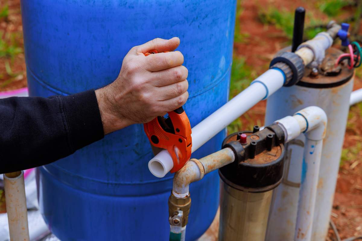 Tri-County Pumps technician performing well pump installation